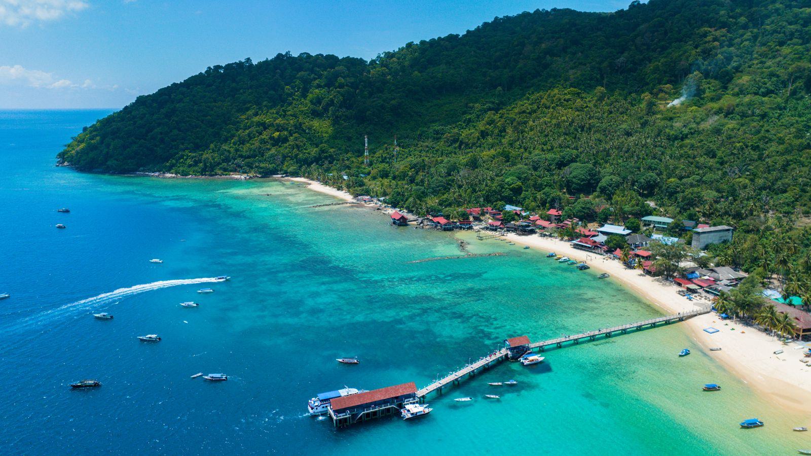 Aerial view of turquoise water and coral off Tioman Island
